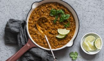 plant-based dinner - cream coconut lentil curry in a cast iron skillet