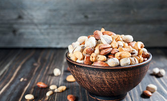 Ultimate Guide to Nuts Overview Of All Types Of Nuts in a bowl